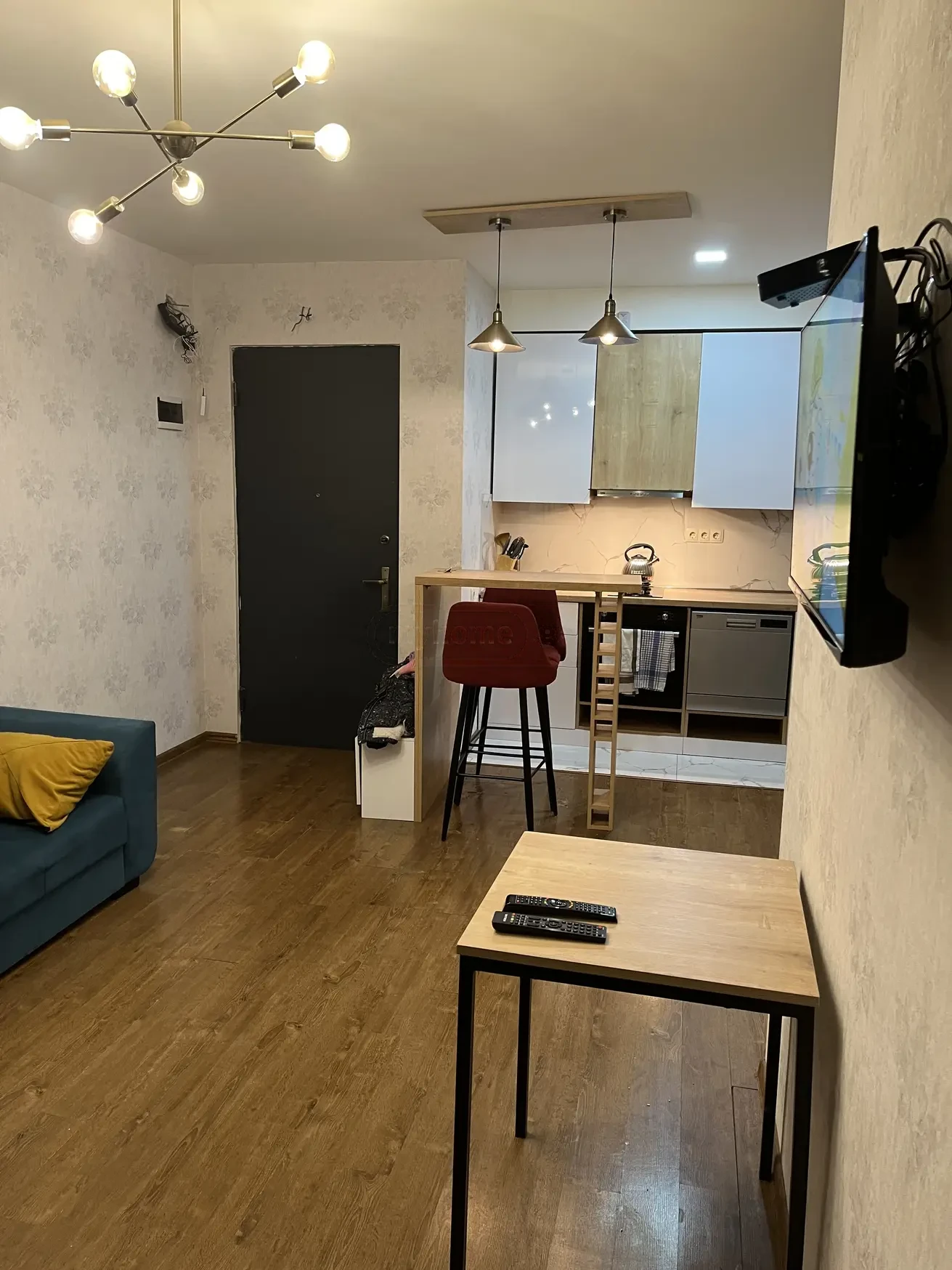 2-room apartment for rent on Chkondideli Street, Nadzaladevi, Tbilisi — open-plan kitchen and living area