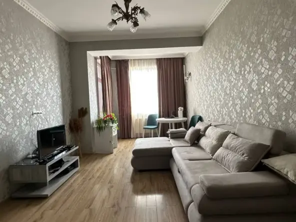 2-room apartment for rent on Chkondideli Street, Nadzaladevi, Tbilisi — living room with corner sofa