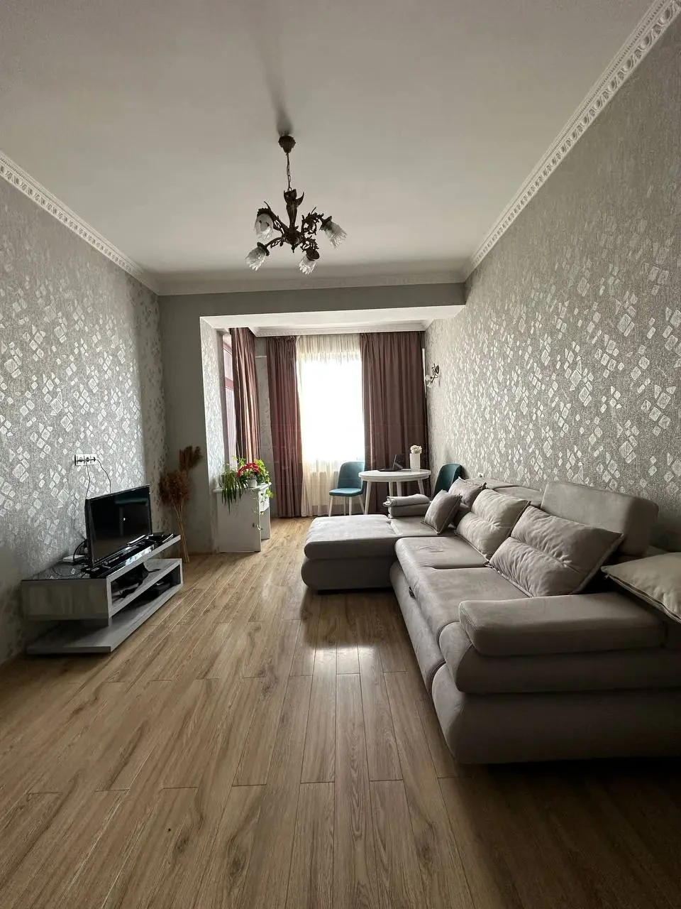 2-room apartment for rent on Chkondideli Street, Nadzaladevi, Tbilisi — living room with corner sofa