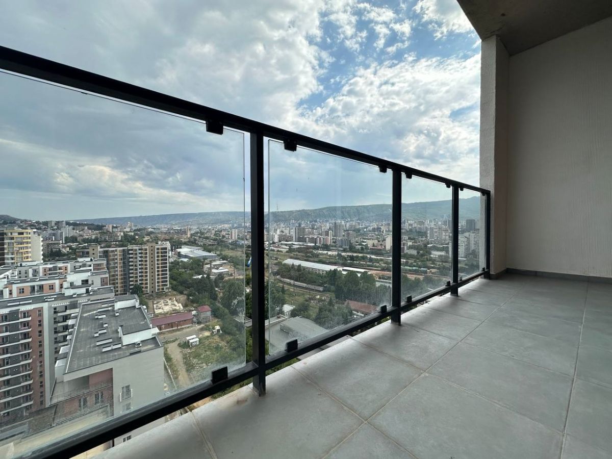 2-room apartment for rent on Chkondideli Street, Nadzaladevi, Tbilisi — balcony with panoramic Tbilisi city view
