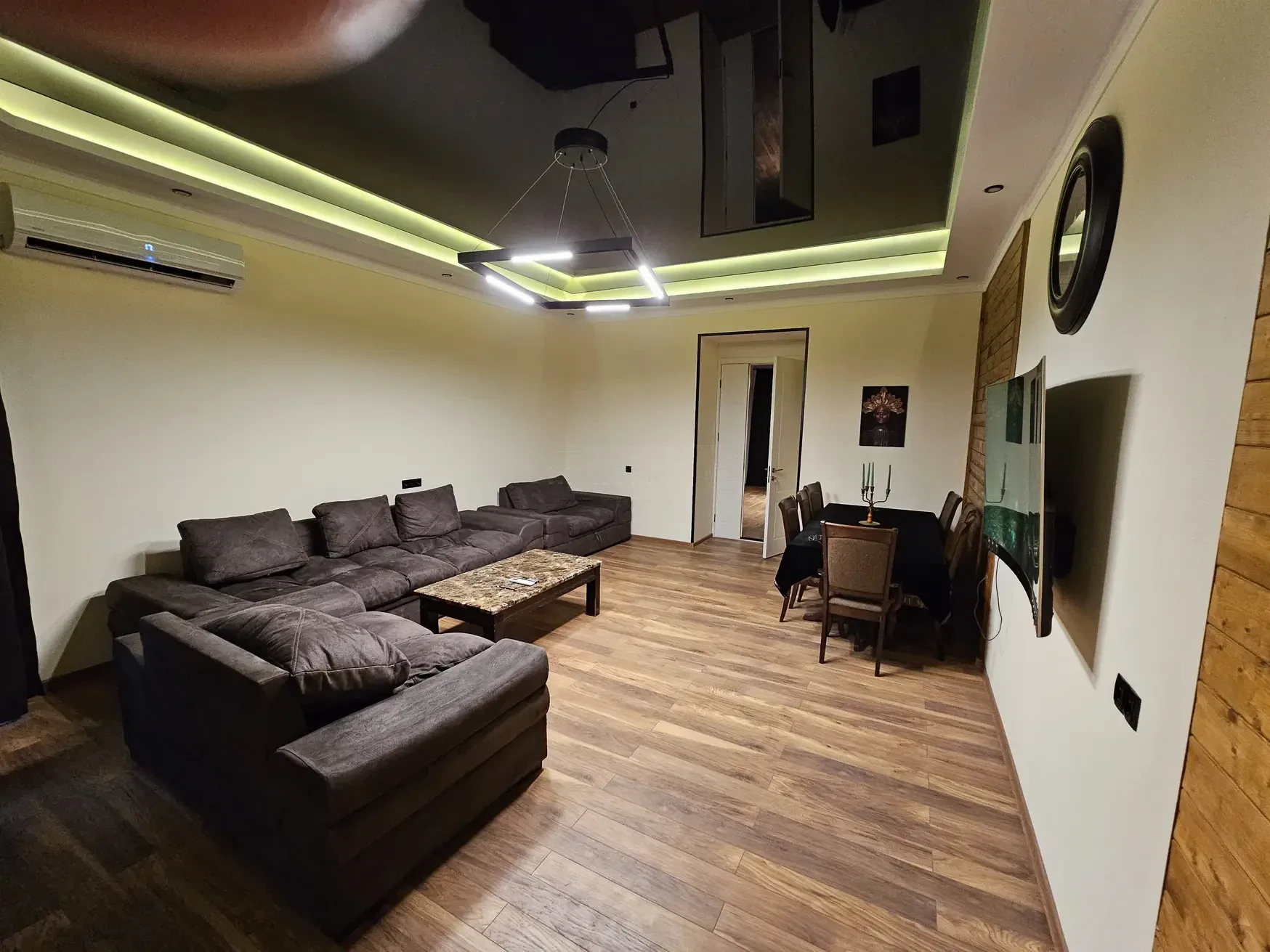 2-room apartment for rent on Tovstonogovi Street, Chugureti, Tbilisi — living room with LED ceiling