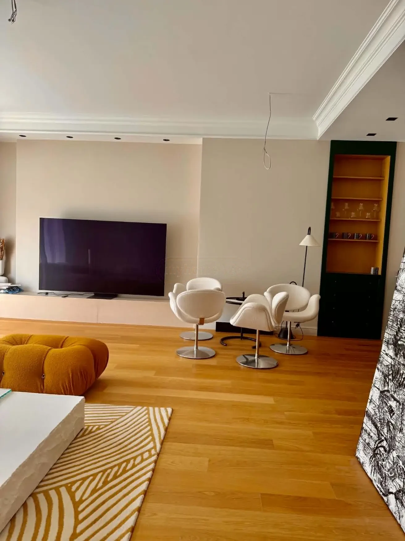 2-room apartment for sale on Ilia Chavchavadze Avenue, Vake, Tbilisi - living room with television and dining seating
