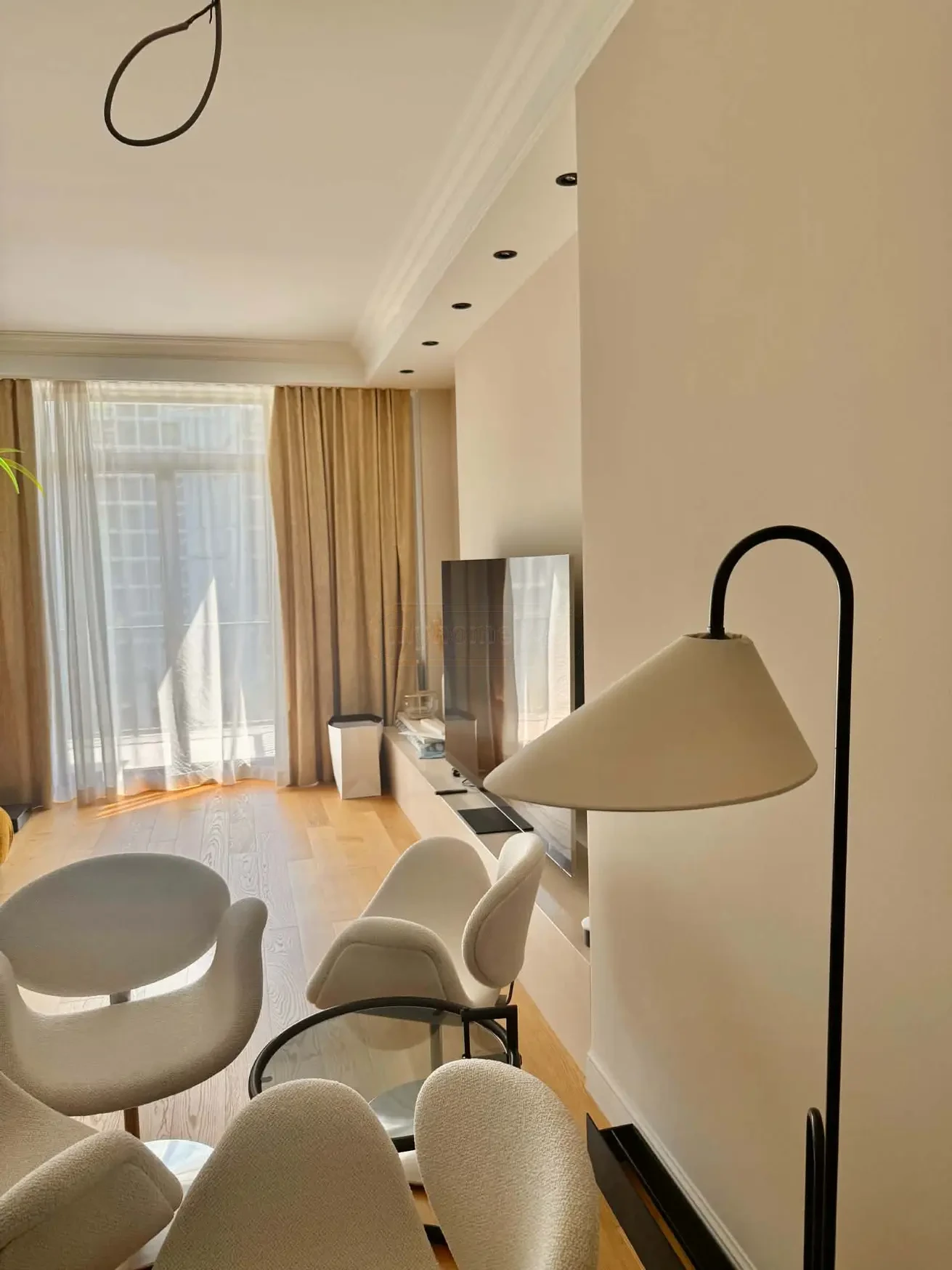 2-room apartment for sale on Ilia Chavchavadze Avenue, Vake, Tbilisi - seating corner with armchairs and floor lamp