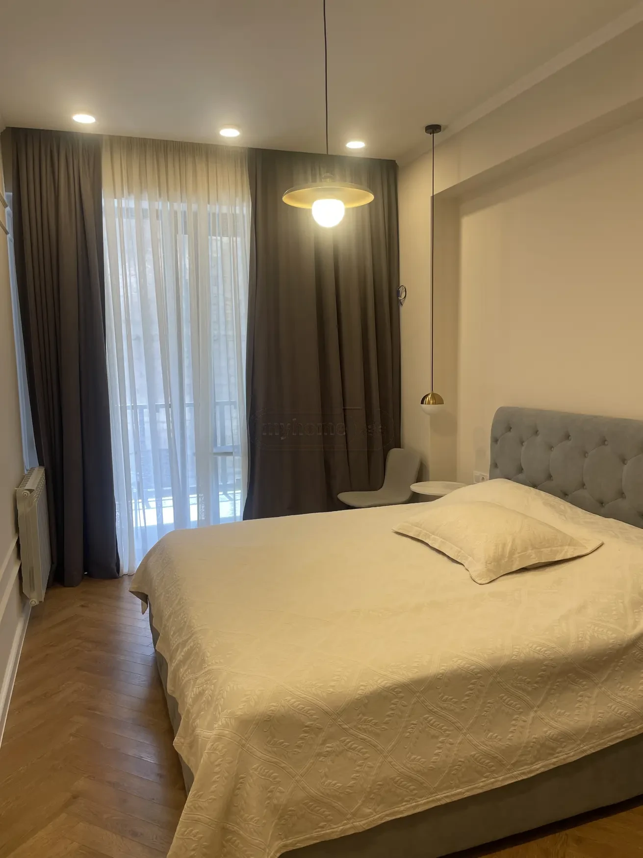 2-room apartment for sale on Kipshidze Street, Vake, Tbilisi - bedroom with balcony window and natural light