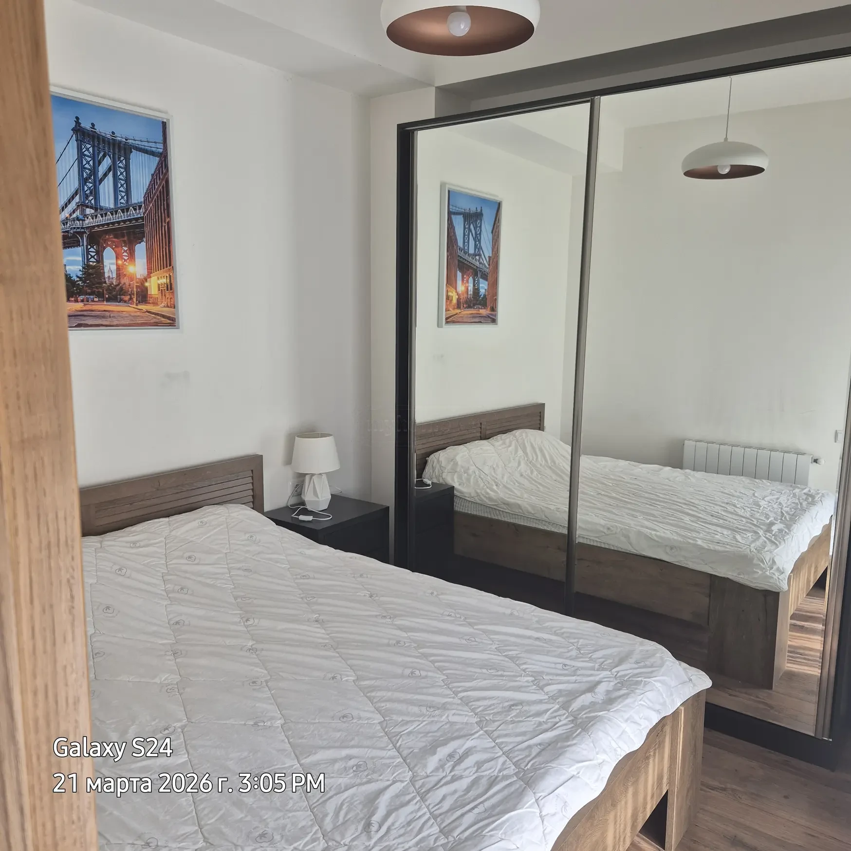2-room apartment for sale on Mtskheta Street, Vake, Tbilisi — bedroom with mirrored wardrobe