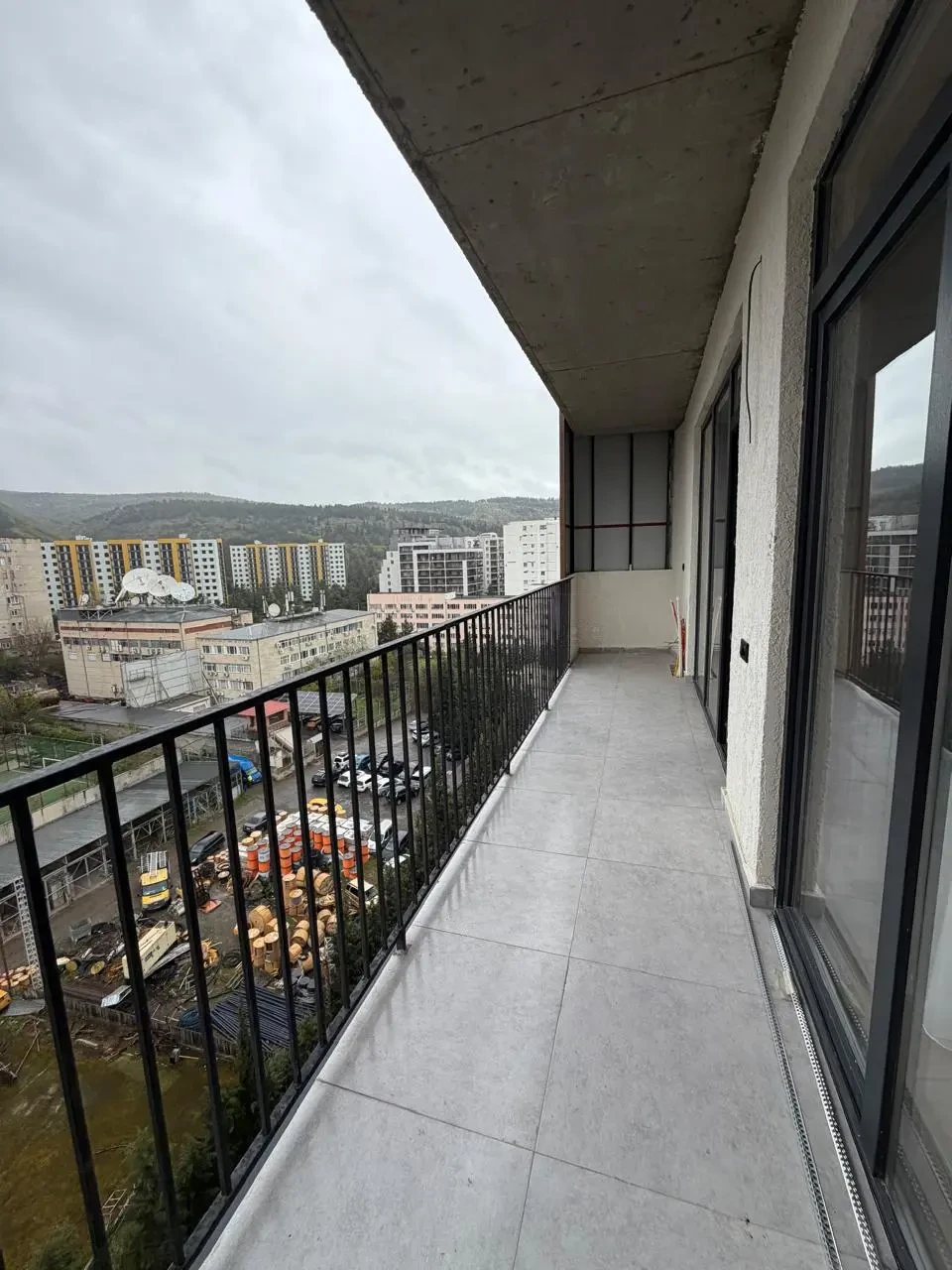2-room apartment for sale on Politkovskaya Street 40a, Saburtalo, Tbilisi — long covered balcony