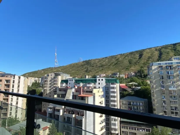 2-room apartment for sale on Shatberashvili Street, Vake, Tbilisi — view of Mtatsminda and the TV tower from the balcony