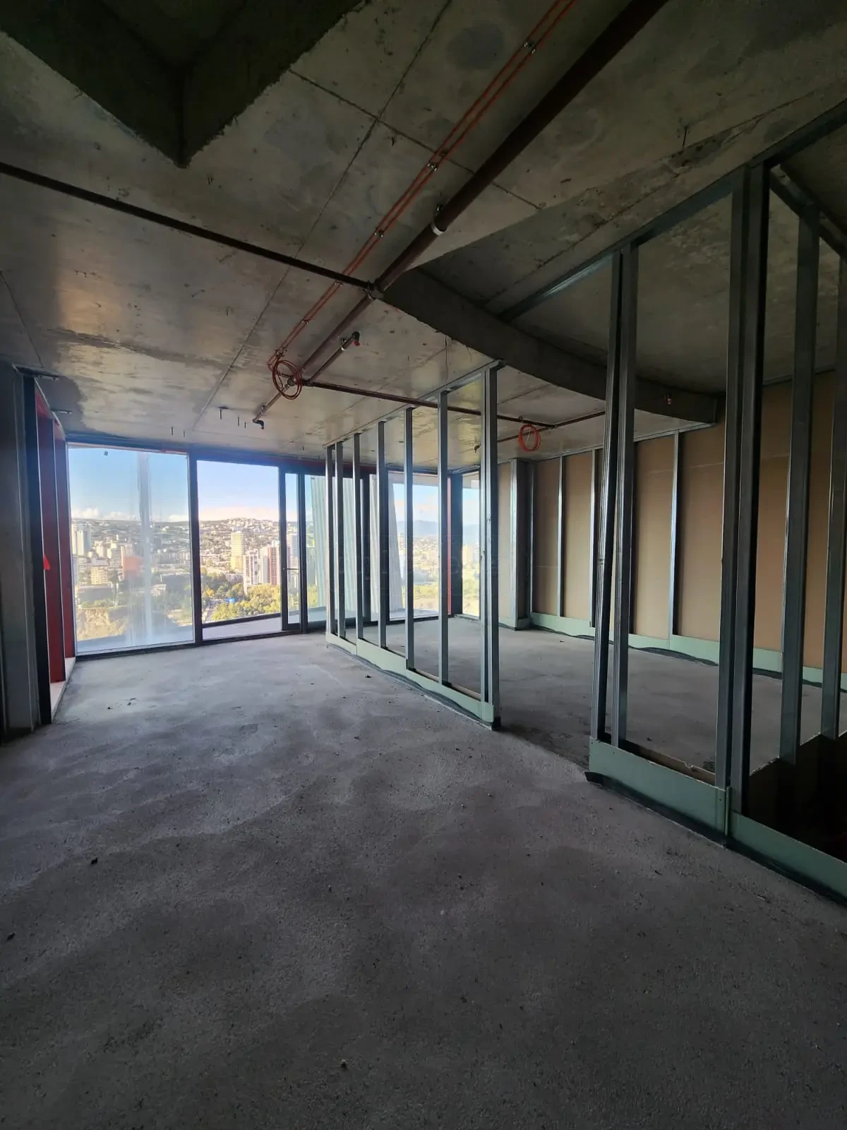 2-room apartment for sale on Tamarashvili Street, Vake, Tbilisi — white-frame living area with city view