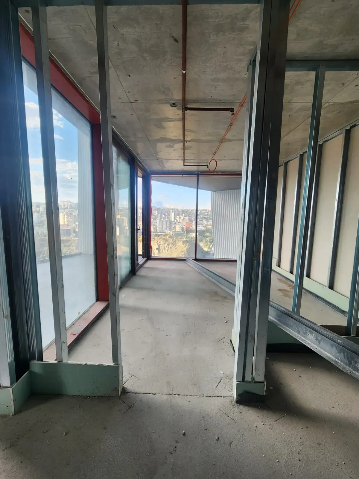 2-room apartment for sale on Tamarashvili Street, Vake, Tbilisi — glazed corner of the apartment looking towards the city