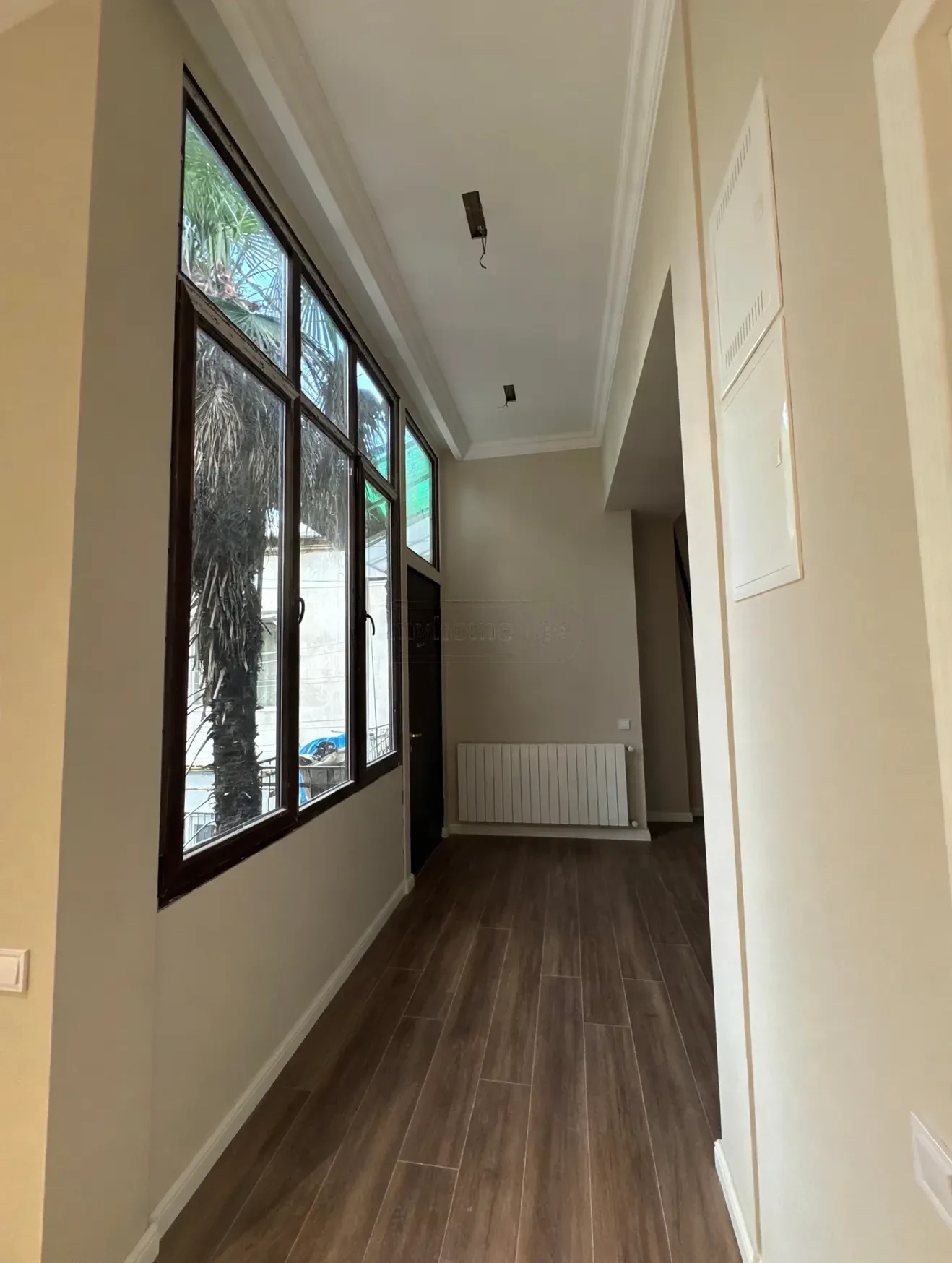 2-room apartment for sale on Tsinamdzghvrishvili Street, Chugureti, Tbilisi — enclosed veranda with panoramic windows
