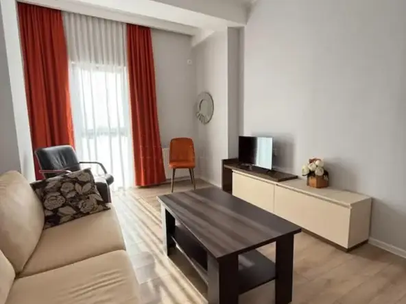 3-room apartment for rent on Chkondideli Street, Nadzaladevi, Tbilisi — living room with sofa and TV