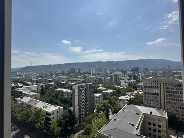 3-room apartment for rent on Shartava Street, Saburtalo, Tbilisi — city and mountain view from the 16th-floor window