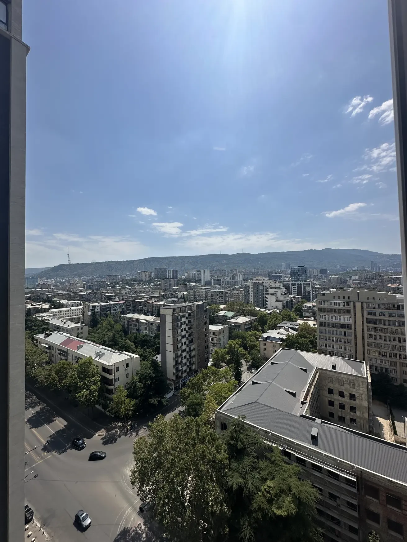 3-room apartment for rent on Shartava Street, Saburtalo, Tbilisi — city and mountain view from the 16th-floor window