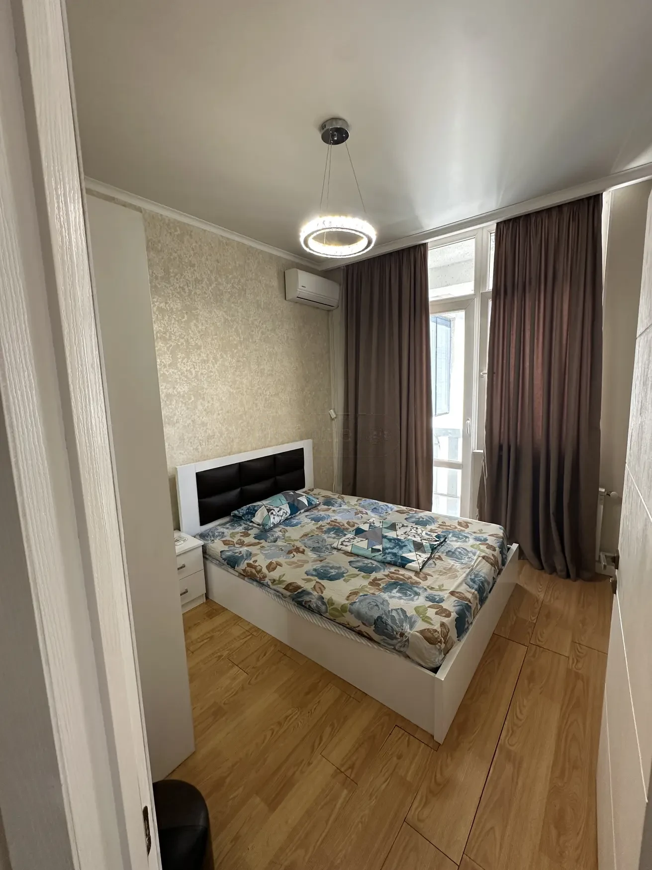 3-room apartment for rent on Shartava Street, Saburtalo, Tbilisi — main bedroom with air conditioning and balcony access