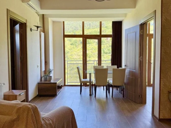 3-room apartment for sale on Chavchavadze Avenue, Vake, Tbilisi — living and dining room with panoramic doors to the balcony