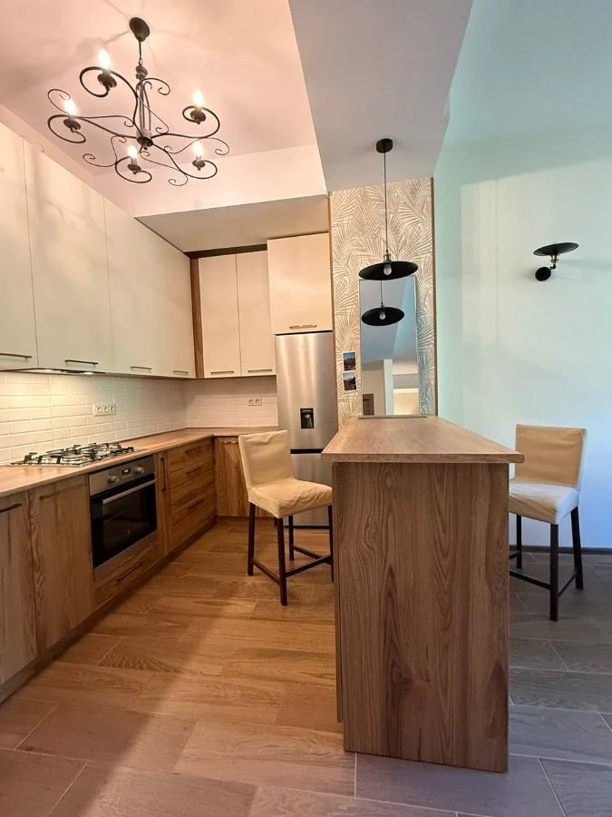 3-room apartment for sale on Chavchavadze Avenue, Vake, Tbilisi — kitchen island with bar seating