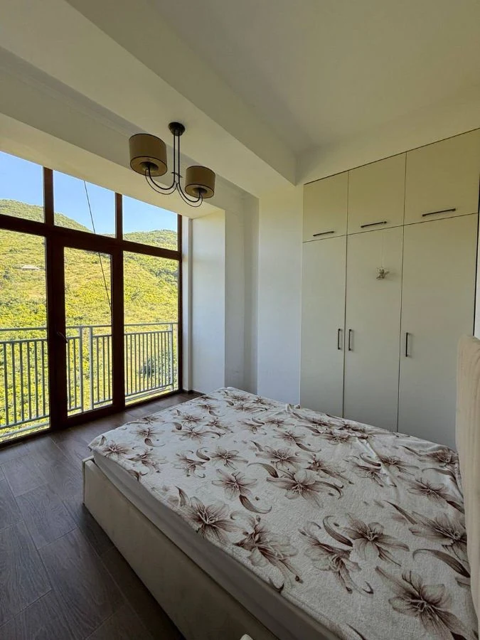 3-room apartment for sale on Chavchavadze Avenue, Vake, Tbilisi — main bedroom with its own balcony and green hillside view