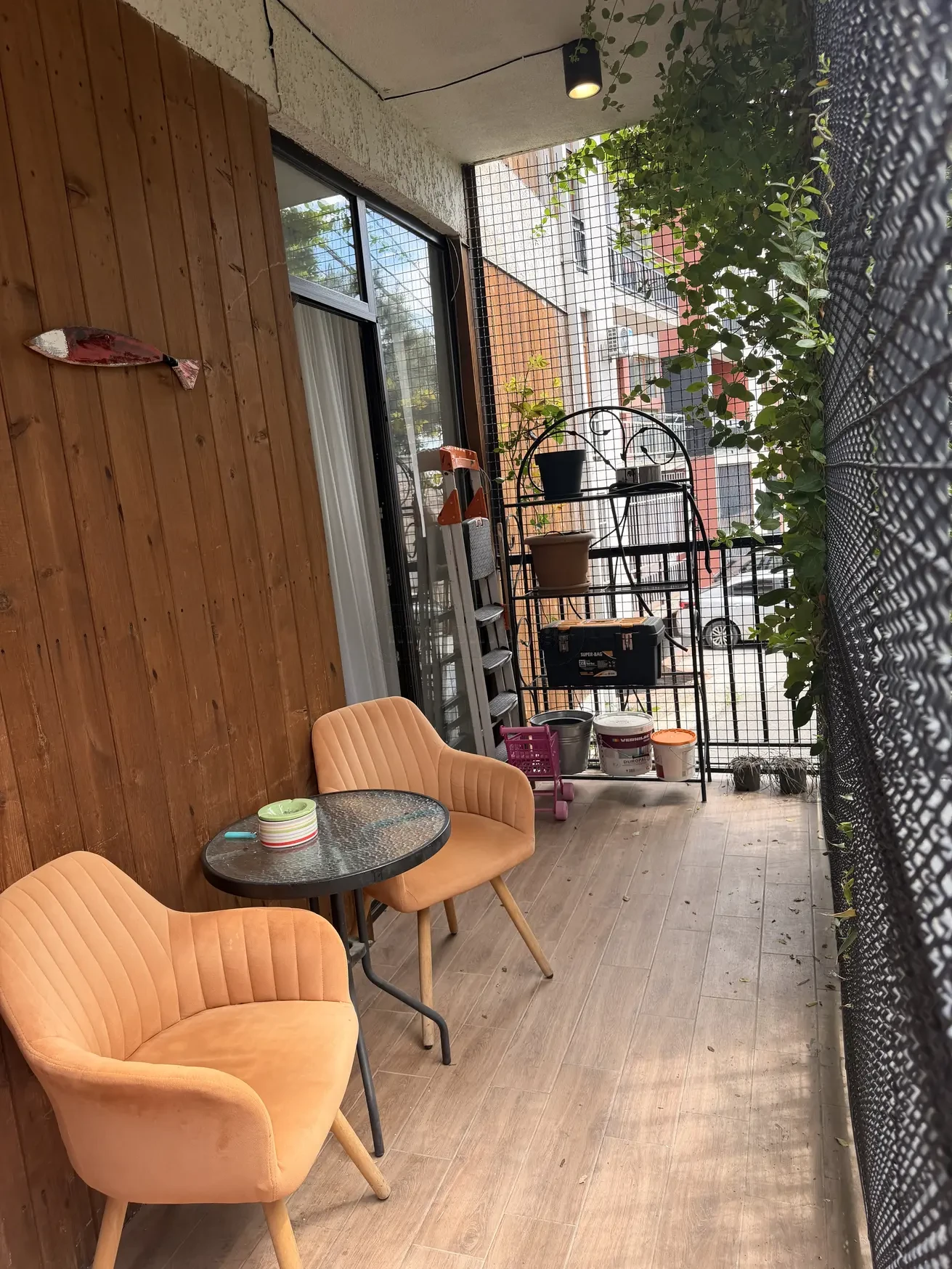 3-room apartment for sale on Marabda Street, Vake, Tbilisi — enclosed balcony with plants and street view