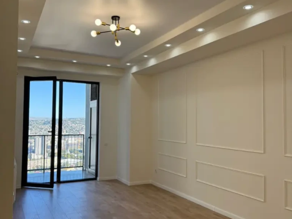 3-room apartment for sale on Shartava Street 43, Saburtalo, Tbilisi - living room with balcony access and panoramic city view