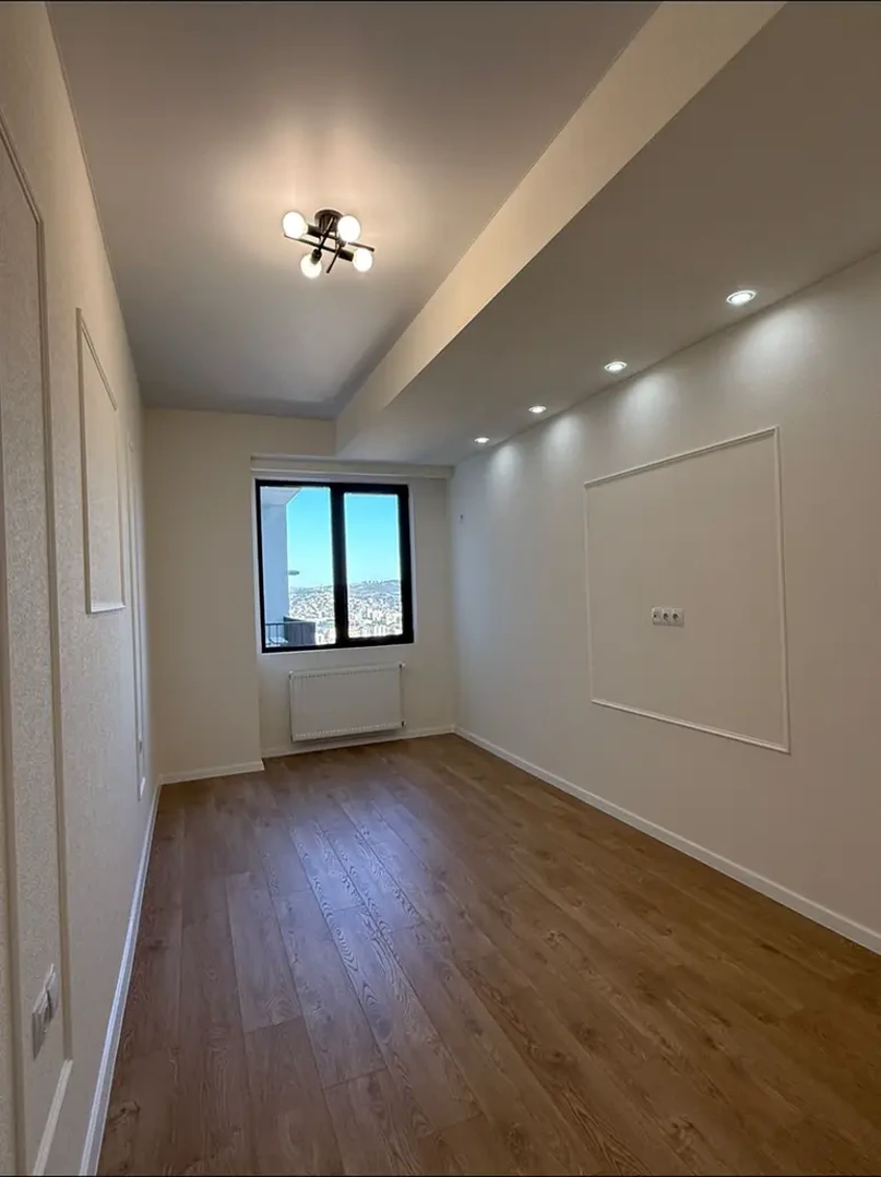 3-room apartment for sale on Shartava Street 43, Saburtalo, Tbilisi - bedroom with city-view window