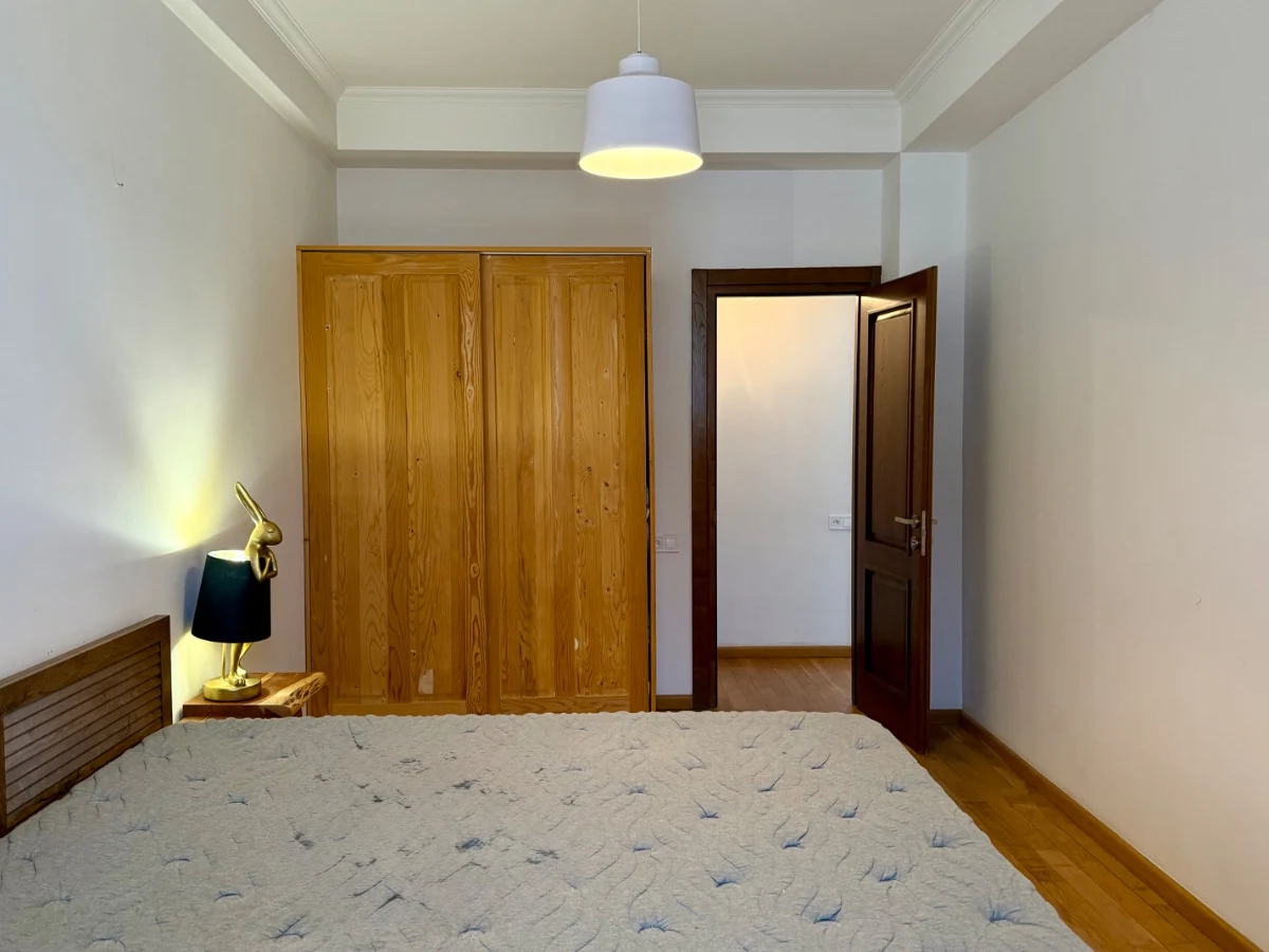 4-room apartment for sale on Marabda Street, Vake, Tbilisi — third bedroom with a built-in oak wardrobe