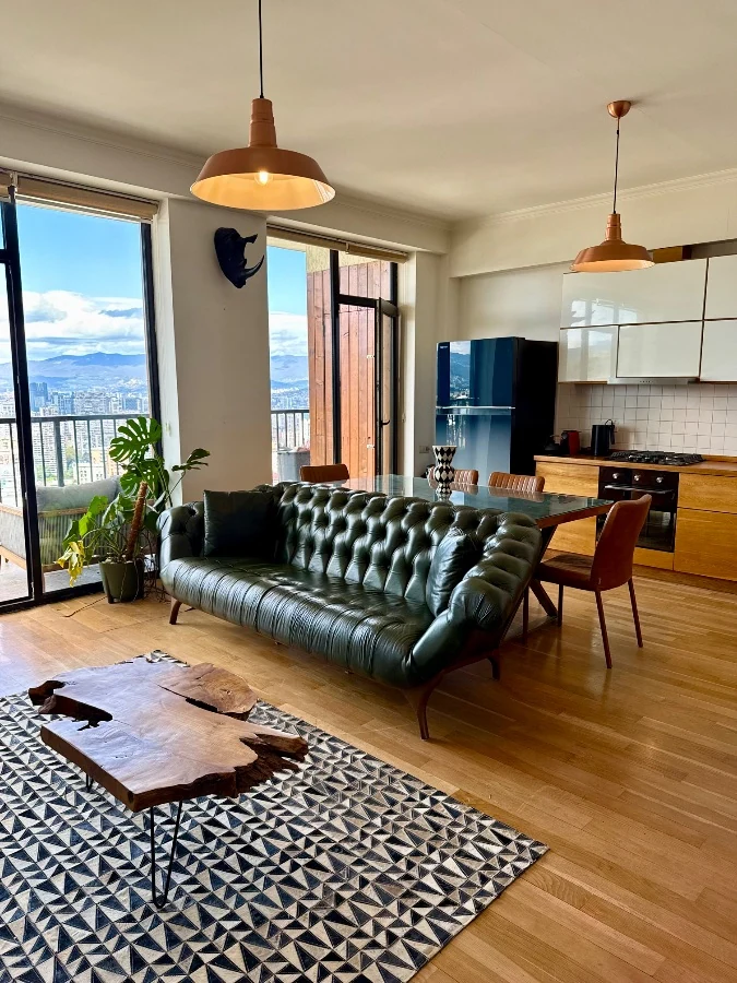 4-room apartment for sale on Marabda Street, Vake, Tbilisi — living room with the city view through floor-to-ceiling windows