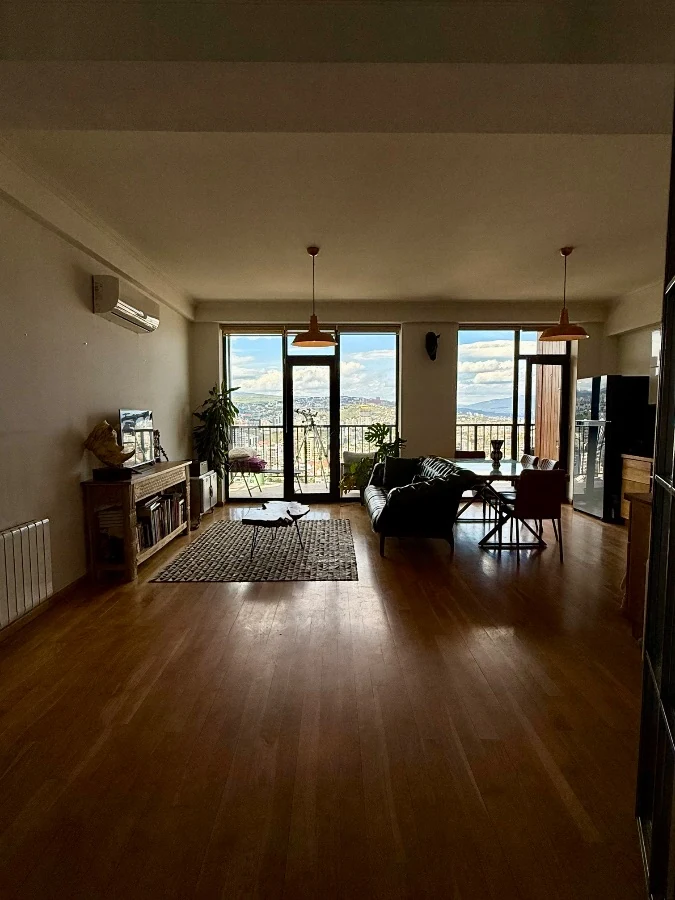 4-room apartment for sale on Marabda Street, Vake, Tbilisi — living room looking towards the balconies