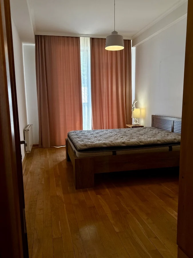 4-room apartment for sale on Marabda Street, Vake, Tbilisi — second bedroom with a tall balcony window