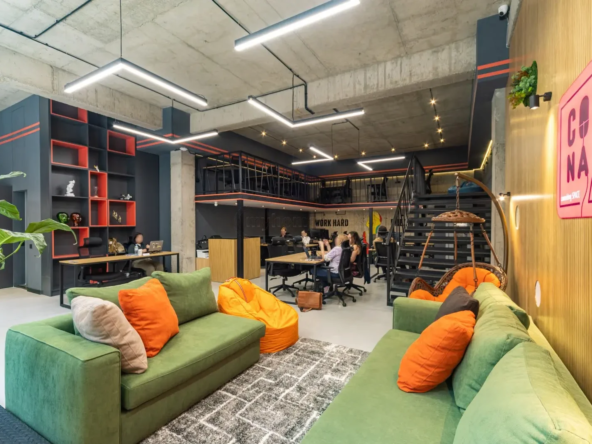 office space for rent on Politkovskaya Street (Jikia), Saburtalo, Tbilisi — wide coworking floor with lounge and mezzanine