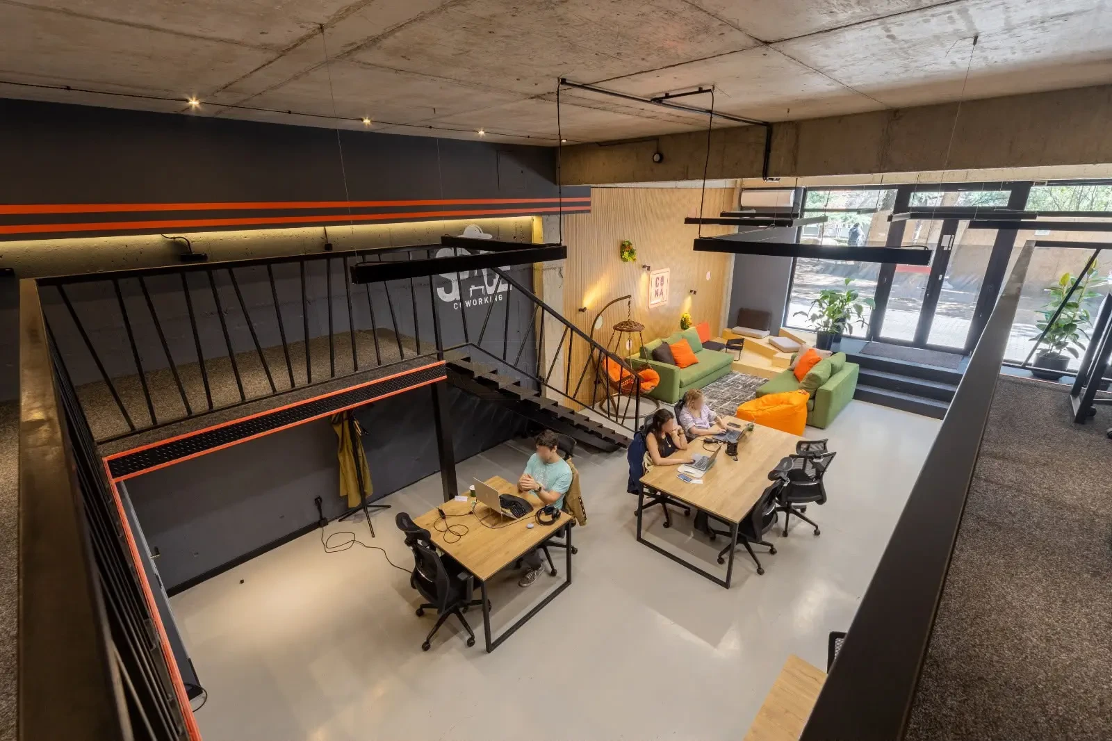 office space for rent on Politkovskaya Street (Jikia), Saburtalo, Tbilisi — view from the mezzanine over the lounge and entrance
