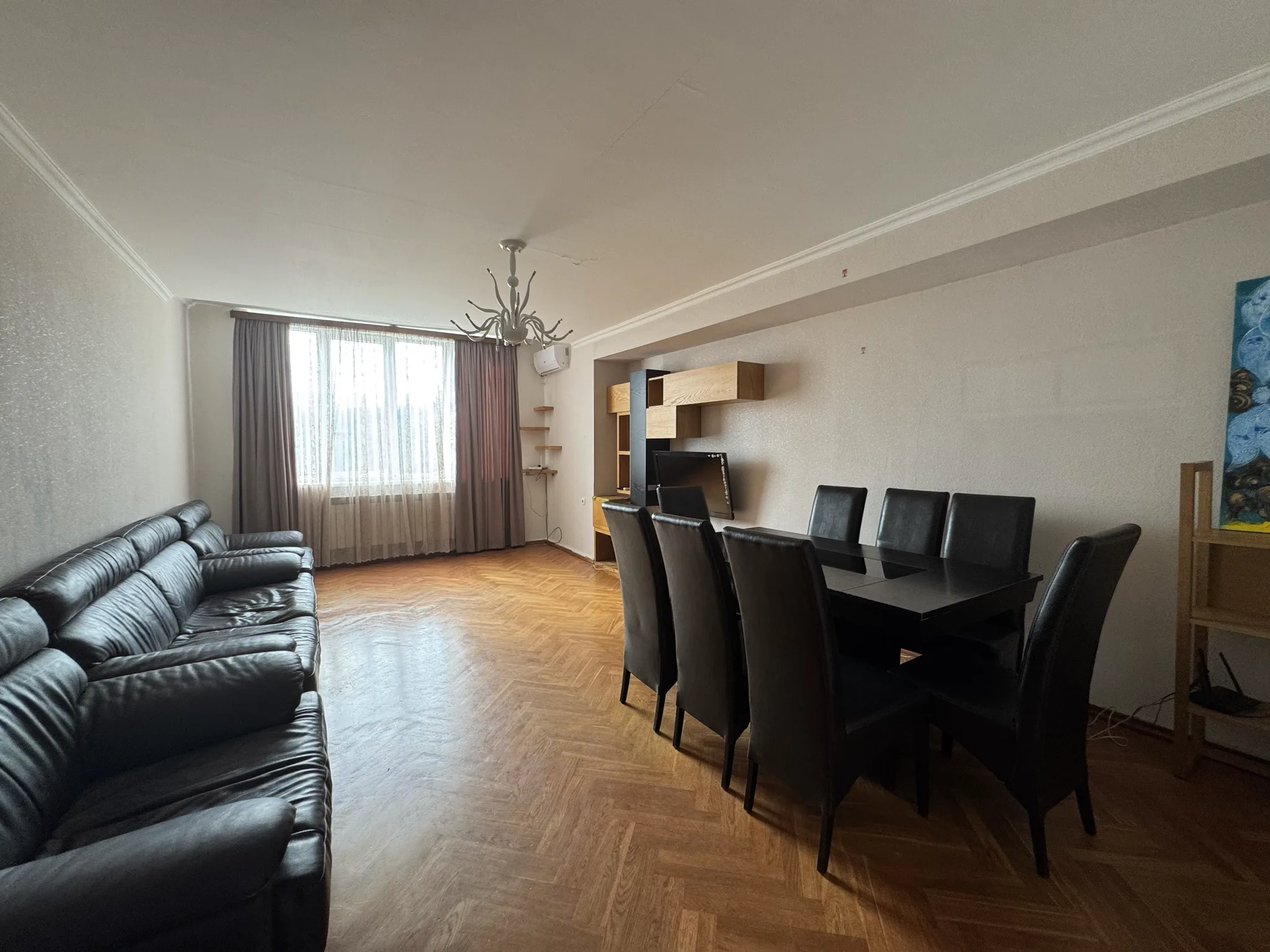 3-room apartment for rent on Besarion Jgenti Street, Nutsubidze, Tbilisi — living room with dining area