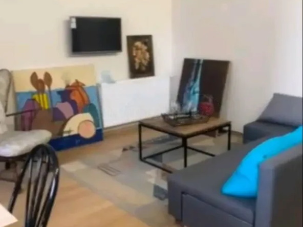 3-room apartment for rent on Tskneti Highway, Bagebi, Tbilisi — living room with TV and sofa