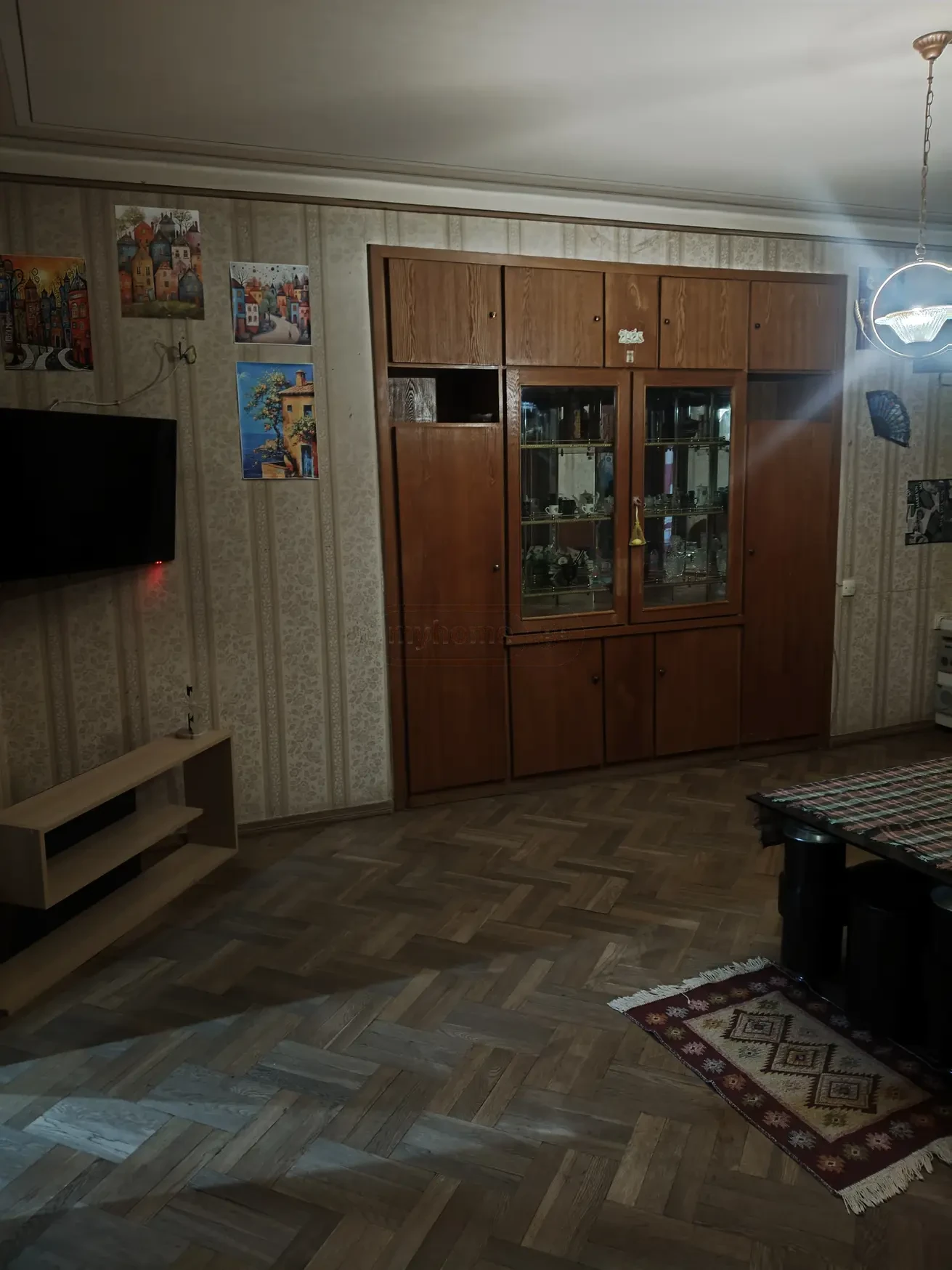 3-room apartment for rent on Tskneti Street, Vake, Tbilisi — living room with TV and cabinets