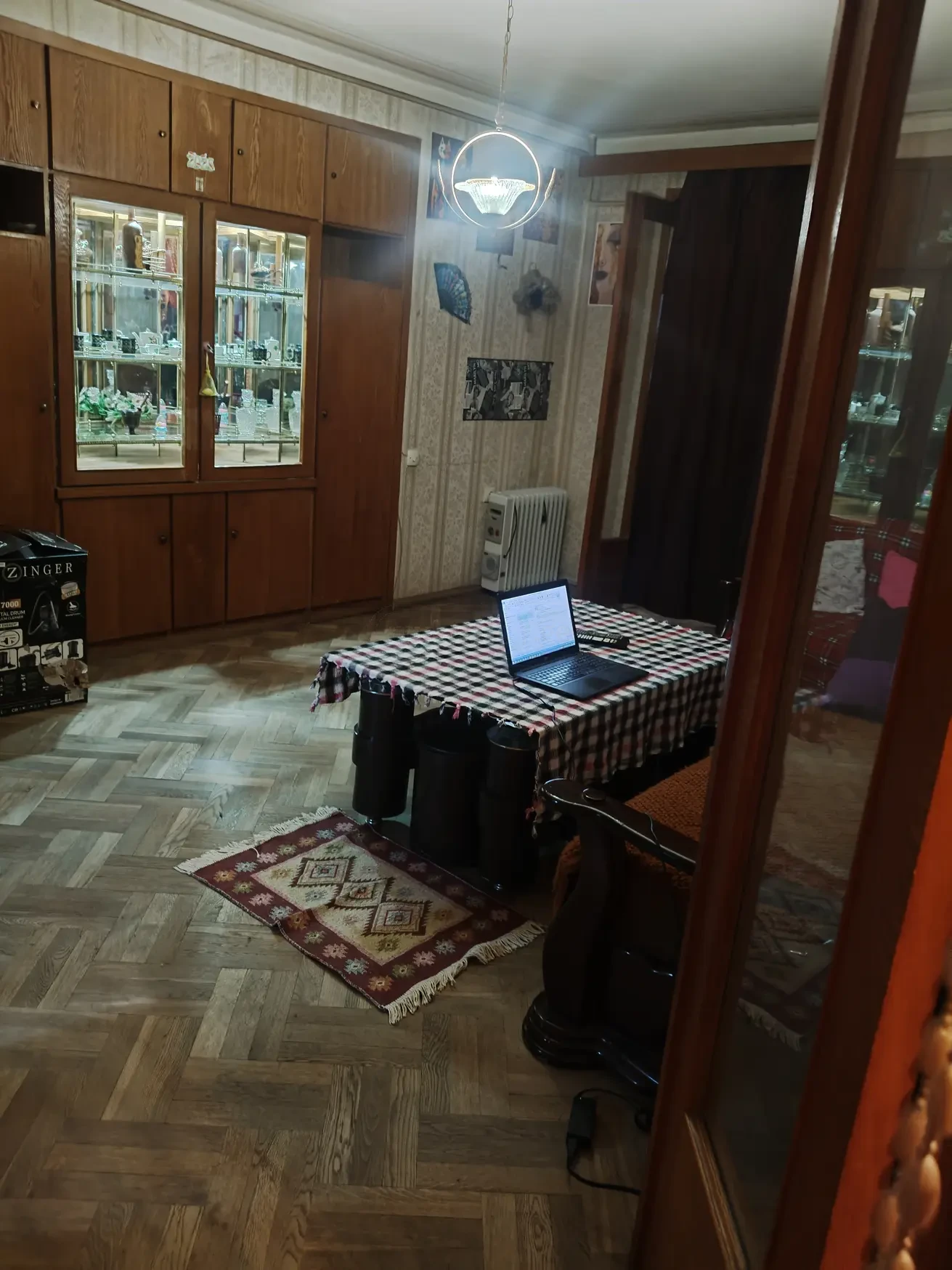 3-room apartment for rent on Tskneti Street, Vake, Tbilisi — living room with dining table