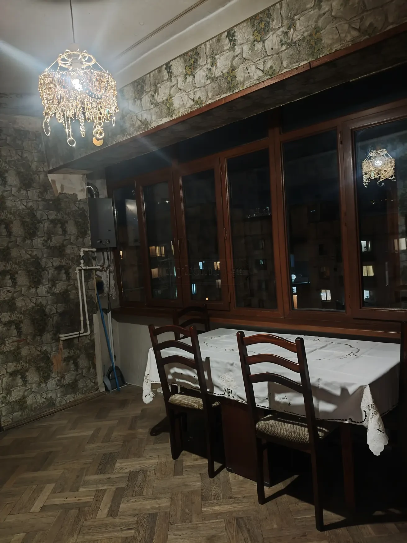 3-room apartment for rent on Tskneti Street, Vake, Tbilisi — dining corner in the evening