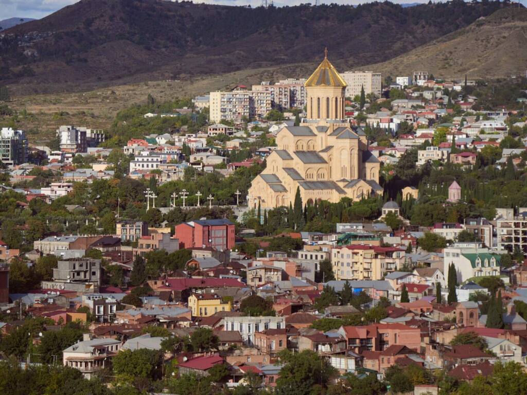 View over Tbilisi rooftops and Sameba Cathedral — the city we show you on the one-day real estate tour